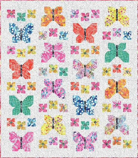 Image of the Flutterby Quilt Pattern by Blooming Boldly Designs for RIley Blake Designs. Features butterflies on a quilt. 
Cute Little Fabric Shop