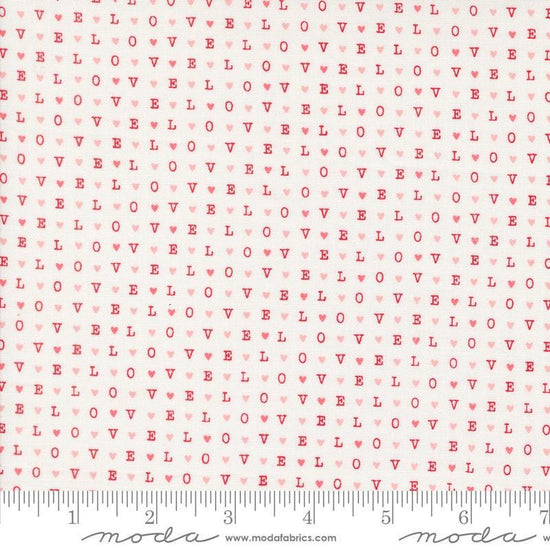 Image of the Love Blooms LOVE Lace quilting cotton fabric by Moda Fabrics. Features the word LOVE on a white background. Cute Little Fabric Shop