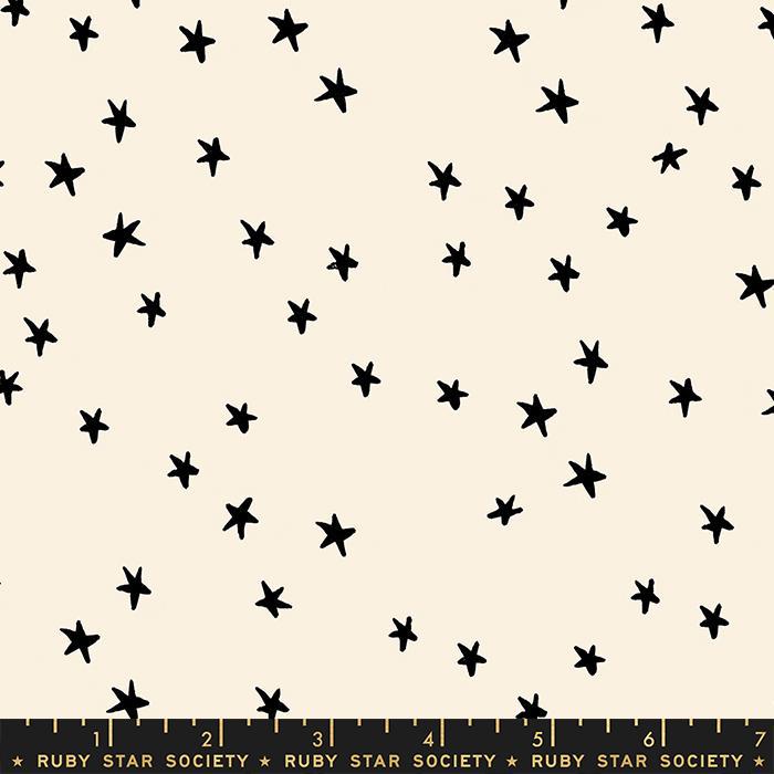 Image of the Starry Blenders Star Natural quilting cotton fabric by Alexia Abegg for Moda Fabrics. Features small scattered stars on a cream background. Cute Little Fabric Shop