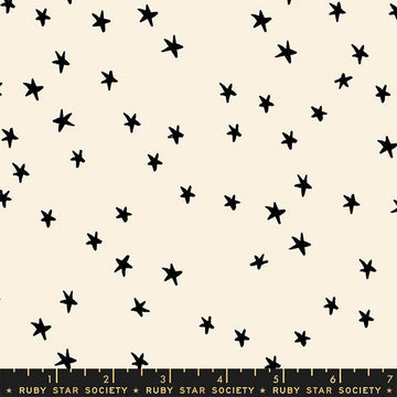 Image of the Starry Blenders Star Natural quilting cotton fabric by Alexia Abegg for Moda Fabrics. Features small scattered stars on a cream background. Cute Little Fabric Shop