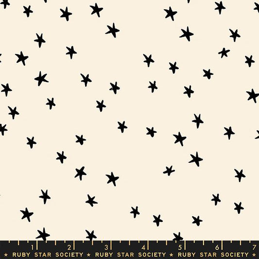 Image of the Starry Blenders Star Natural quilting cotton fabric by Alexia Abegg for Moda Fabrics. Features small scattered stars on a cream background. Cute Little Fabric Shop