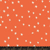Image of the Starry Blenders Star Nutmeg quilting cotton fabric by Alexia Abegg for Moda Fabrics. Features small scattered stars on an orange background. Cute Little Fabric Shop