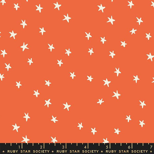 Image of the Starry Blenders Star Nutmeg quilting cotton fabric by Alexia Abegg for Moda Fabrics. Features small scattered stars on an orange background. Cute Little Fabric Shop