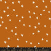 Image of the Starry Blenders Star Saddle quilting cotton fabric by Alexia Abegg for Moda Fabrics. Features small scattered stars on an orange background. Cute Little Fabric Shop