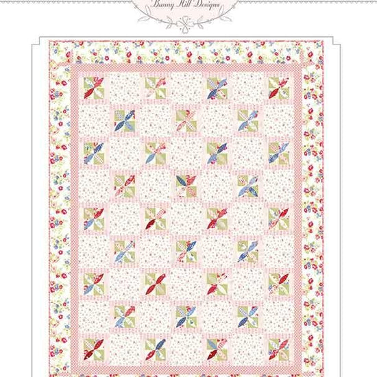 Image of the Rainbow Sherbet quilt pattern by Anne Sutton for Moda Fabrics. Features a quilt with pink and floral fabrics. 
Cute Little Fabric Shop