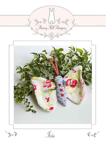 Image of the Iris quilt pattern by Bunny Hill Design for Moda Fabrics. Features a butterfly made out of floral fabrics. 
Cute Little Fabric Shop