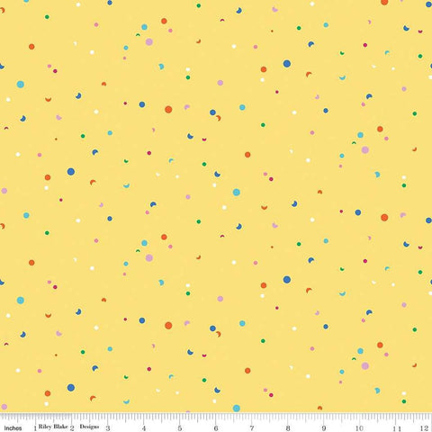 Image of the Celebrate Confetti Yellow
 quilting cotton fabric by Sue Daley for Riley Blake Designs. Features brightly colored dots and crescent moons on a yellow background.
Cute Little Fabric Shop