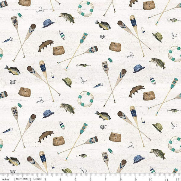 Parchment cream quilting cotton fabric featuring Riley Blake&#39;s Wake at the Lake fabric. This fabric features scattered illustrations of fish, oars, hats, and hooks. 
Cute Little Fabric Shop