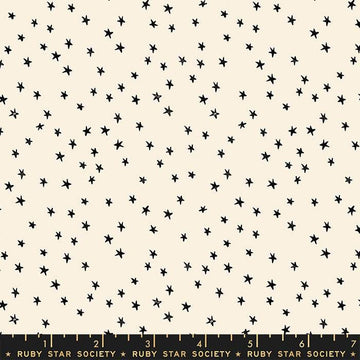 Image of the Starry Blenders Star Natural quilting cotton fabric by Alexia Abegg for Moda Fabrics. Features small scattered stars on a cream background. Cute Little Fabric Shop