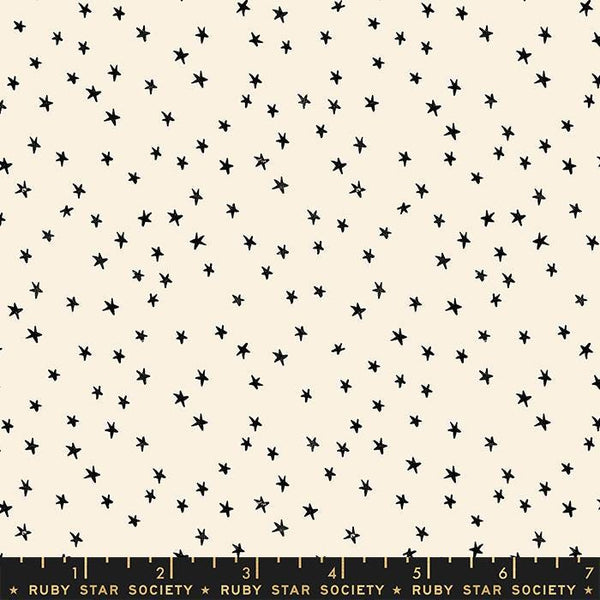 Image of the Starry Blenders Star Natural quilting cotton fabric by Alexia Abegg for Moda Fabrics. Features small scattered stars on a cream background. Cute Little Fabric Shop