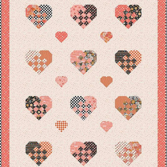 Image of the Holding Hearts quilt pattern by Frannie B Quilting Co for Riley Blake Designs. Features hearts on a quilt. 
Cute Little Fabric Shop