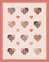 Image of the Holding Hearts quilt pattern by Frannie B Quilting Co for Riley Blake Designs. Features hearts on a quilt. 
Cute Little Fabric Shop