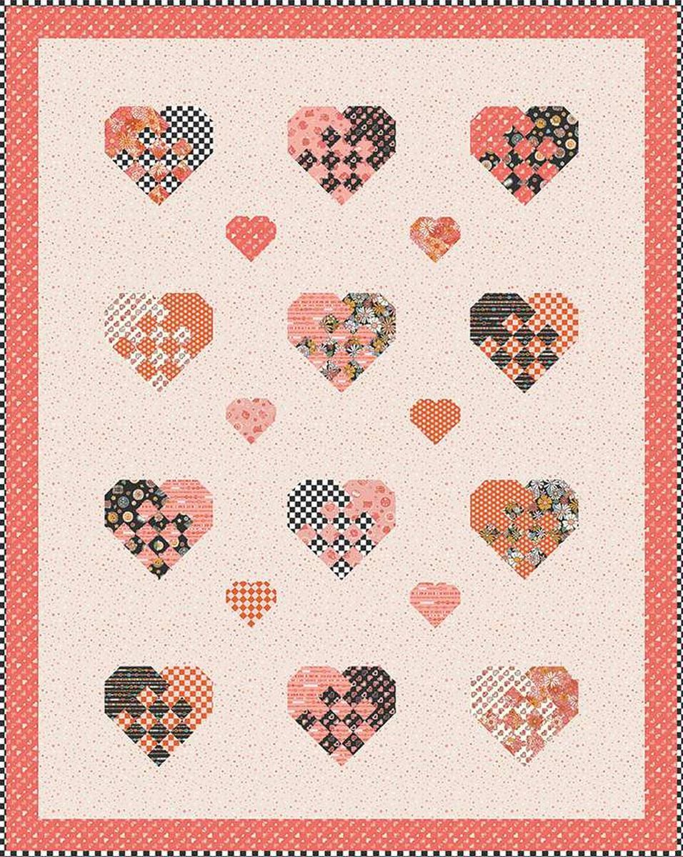 Image of the Holding Hearts quilt pattern by Frannie B Quilting Co for Riley Blake Designs. Features hearts on a quilt. 
Cute Little Fabric Shop