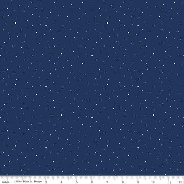 Image of the Wide Back Dapple Dot Navy quilting cotton fabric by Riley Blake Designs.Features white dots on a dark blue background. 
Cute Little Fabric Shop