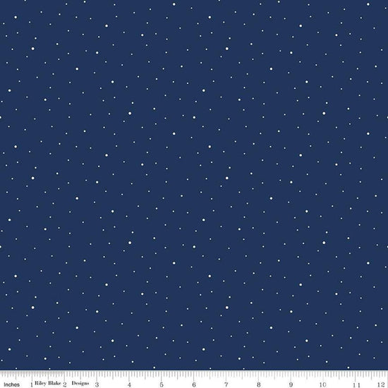 Image of the Wide Back Dapple Dot Navy quilting cotton fabric by Riley Blake Designs.Features white dots on a dark blue background. 
Cute Little Fabric Shop