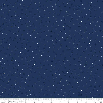 Image of the Wide Back Dapple Dot Navy quilting cotton fabric by Riley Blake Designs.Features white dots on a dark blue background. 
Cute Little Fabric Shop
