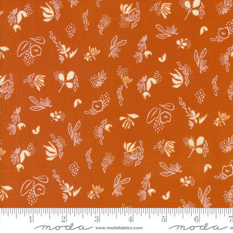 Image of the Things Above Sprinkles Rust quilting cotton fabric by Fancy That Design House for Moda Fabrics. Features flowers on a red background. Cute Little Fabric Shop