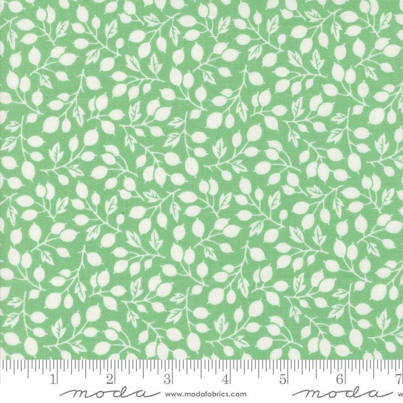 Image of the Portofino Branch Azure quilting cotton fabric by Fig Tree Co for Riley Blake Designs. Features vines on a green background. Cute Little Fabric Shop