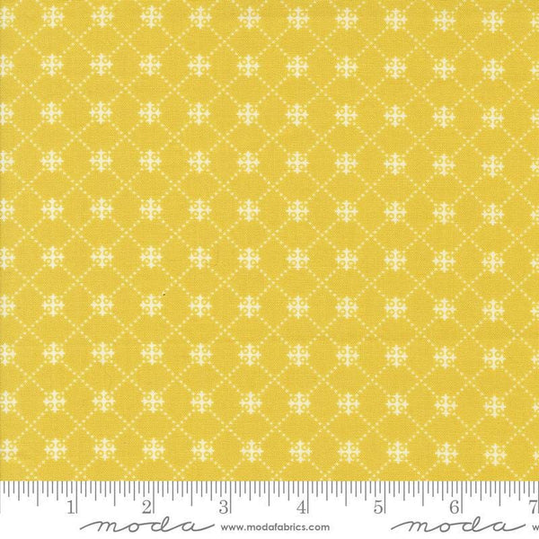 Image of the Portofino Crosses Citron quilting cotton fabric by Fig Tree Co for Riley Blake Designs. Features plaid lines on a yellow background. Cute Little Fabric Shop