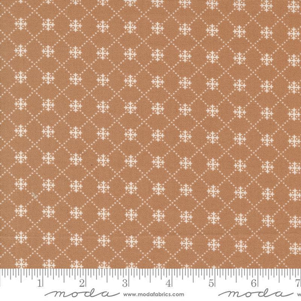 Image of the Portofino Crosses Sierra quilting cotton fabric by Fig Tree Co for Riley Blake Designs. Features plaid lines on a brown background. Cute Little Fabric Shop