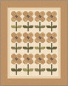 Image of the Pocket Full of Posies quilt pattern by Laugh Yourself Into Stitches by Riley Blake Designs. Features flowers with monochrome brown colors.
Cute Little Fabric Shop