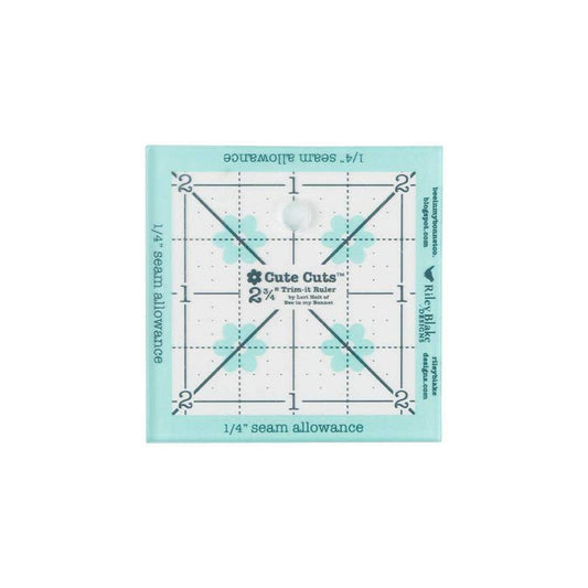 Image of the Cute Cuts™ Trim-it Ruler 2 3/4 inch x 2 3/4 inch by Lori Holt by Riley Blake Designs. Features a non-slip small plastic ruler. 
Cute Little Fabric Shop