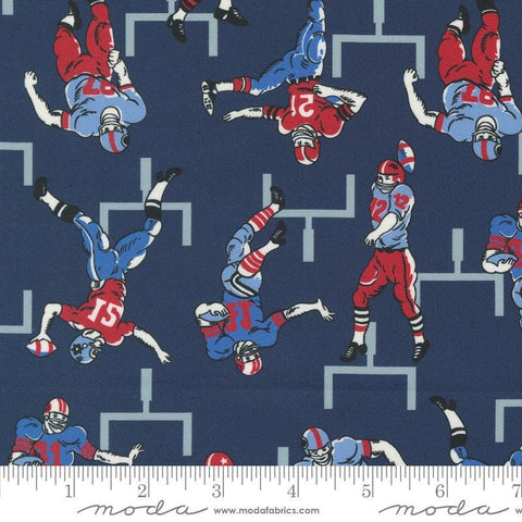 Image of the Play Ball Players Navy quilting cotton fabric by Moda Fabrics. Features novelty football players scattered on a navy background. 
Cute Little Fabric Shop
