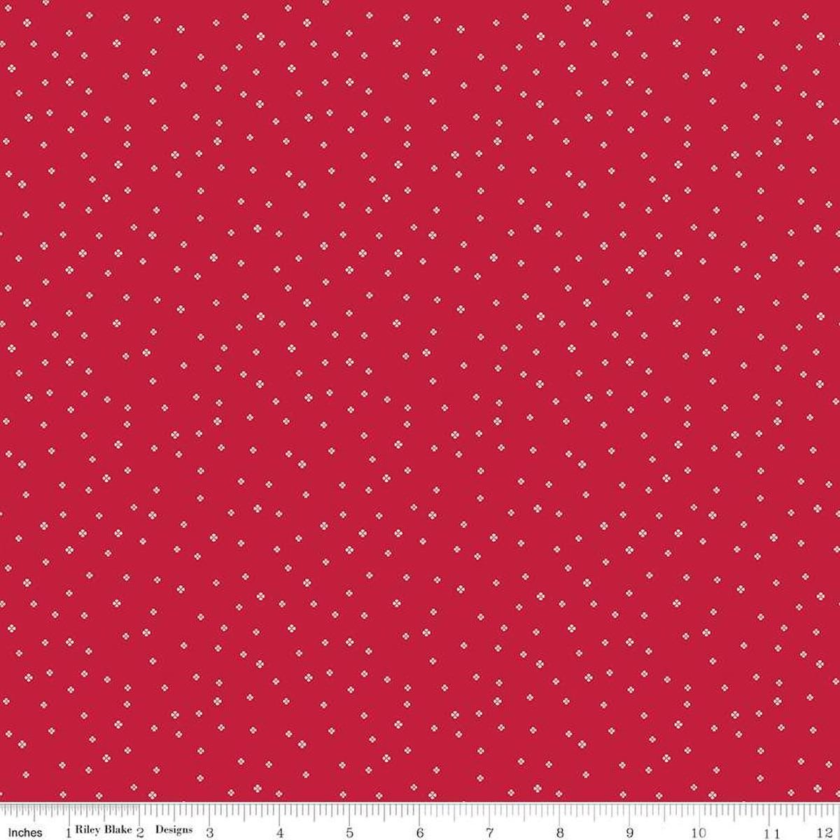Image of the Red Delicious Pomegranate Sorbet Red quilting cotton fabric by Riley Blake Designs. Features tiny scattered blossoms on a red background. 
Cute Little Fabric Shop