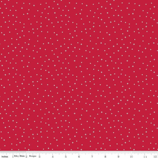 Image of the Red Delicious Pomegranate Sorbet Red quilting cotton fabric by Riley Blake Designs. Features tiny scattered blossoms on a red background. 
Cute Little Fabric Shop