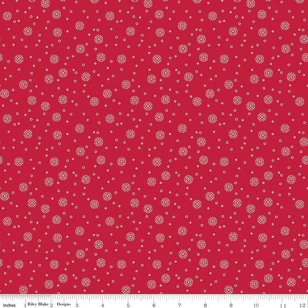 Image of the Red Delicious Cherry Soda Red quilting cotton fabric by Riley Blake Designs. Features scattered blossoms and circles on a red background. 
Cute Little Fabric Shop