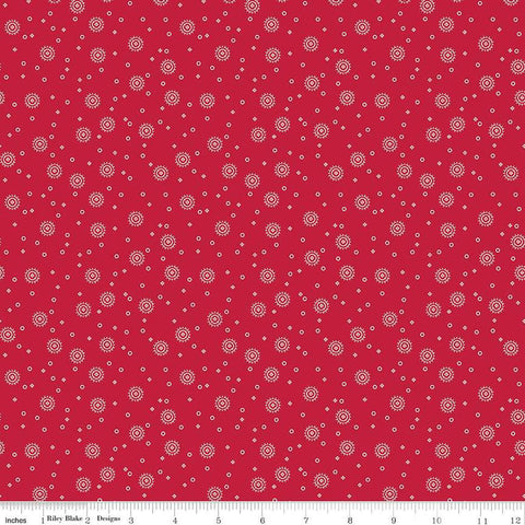 Image of the Red Delicious Cherry Soda Red quilting cotton fabric by Riley Blake Designs. Features scattered blossoms and circles on a red background. 
Cute Little Fabric Shop