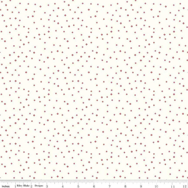 Image of the Red Delicious Pomegranate Sorbet Cloud quilting cotton fabric by Riley Blake Designs. Features tiny scattered blossoms on a cloud background. 
Cute Little Fabric Shop