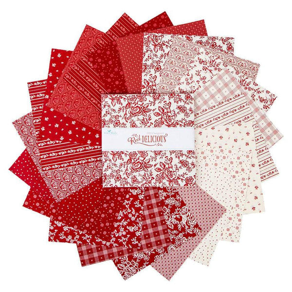 Image of the Red Delicious 10 Inch Stacker by Riley Blake Designs. Features floral fabrics on red and white backgrounds. 
Cute Little Fabric Shop