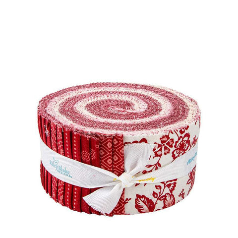 Image of the Red Delicious Rolie Polie by Riley Blake Designs. Features floral fabrics on red and white backgrounds. 
Cute Little Fabric Shop