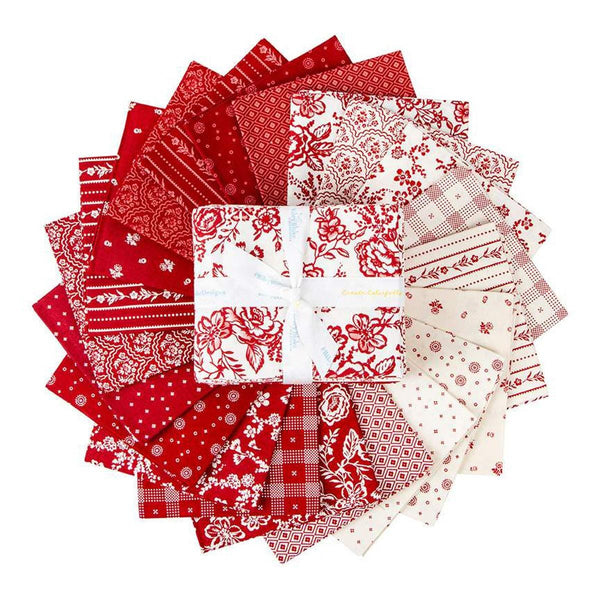 Image of the Red Delicious Fat Quarter Bundle by Riley Blake Designs. Features floral fabrics on red and white backgrounds. 
Cute Little Fabric Shop