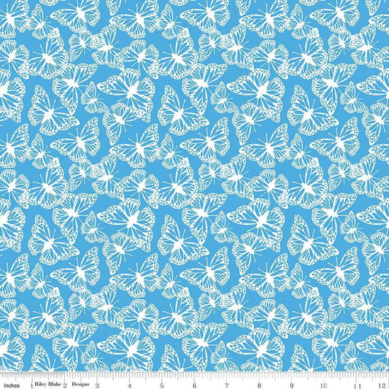 Image of the Friendship Florals Butterflies Blue quilting cotton fabric by Diane Labombarbe for Riley Blake Designs. Features butterflies scattered on a blue background.
Cute Little Fabric Shop
