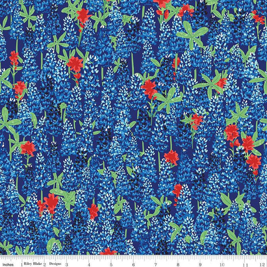 Image of the Friendship Florals Main Royal
 quilting cotton fabric by Diane Labombarbe for Riley Blake Designs. Features a field of bluebonnet flowers on a blue background.
Cute Little Fabric Shop