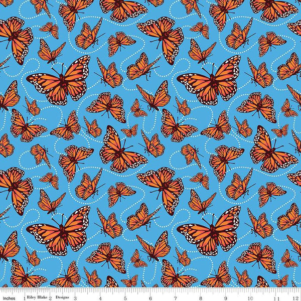 Image of the Friendship Florals Monarchs Blue quilting cotton fabric by Diane Labombarbe for Riley Blake Designs. Features butterflies scattered on a blue background.
Cute Little Fabric Shop