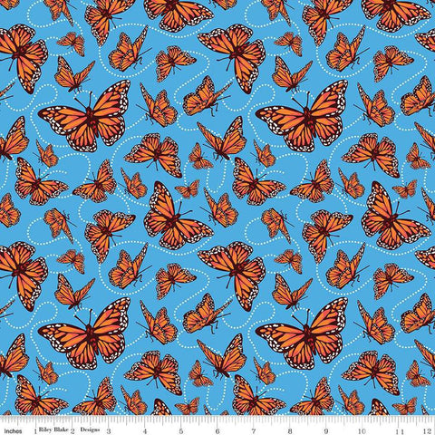 Image of the Friendship Florals Monarchs Blue quilting cotton fabric by Diane Labombarbe for Riley Blake Designs. Features butterflies scattered on a blue background.
Cute Little Fabric Shop