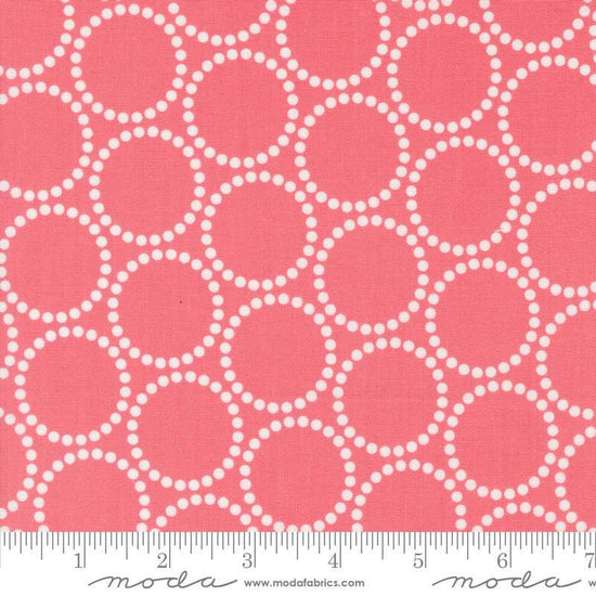 Image of the Love Letter Dots Tea Rose quilting cotton fabric by Lizzy House for Moda Fabrics. Features dotted circles on a pink background. Cure Little Fabric Shop