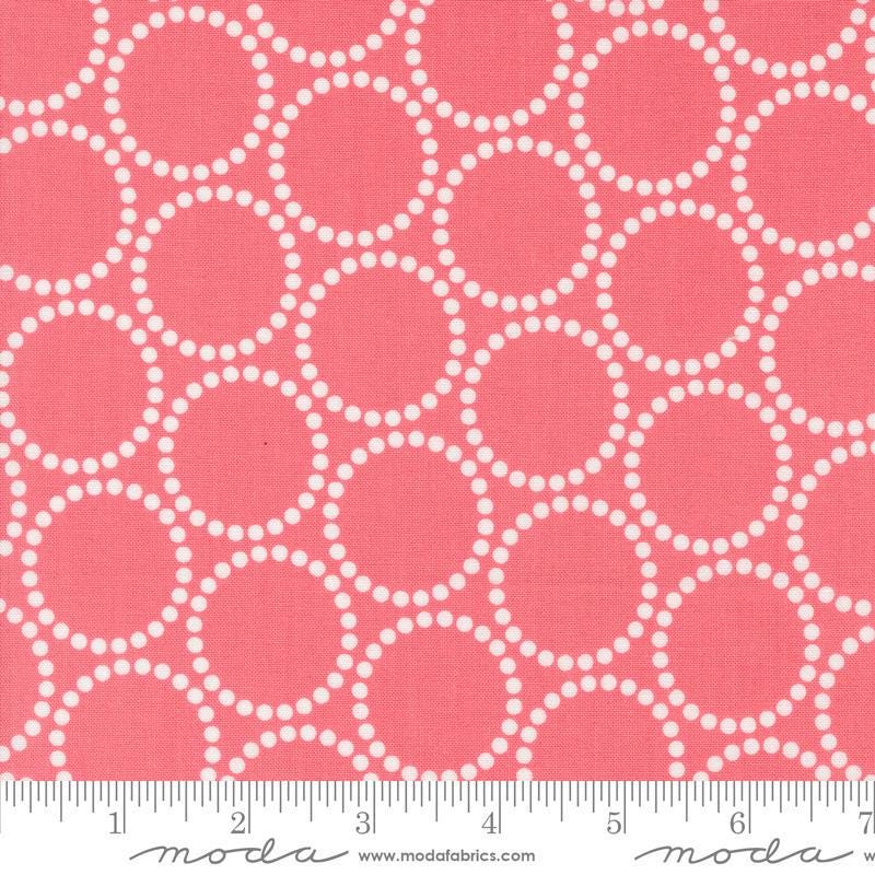 Image of the Love Letter Dots Tea Rose quilting cotton fabric by Lizzy House for Moda Fabrics. Features dotted circles on a pink background. Cure Little Fabric Shop