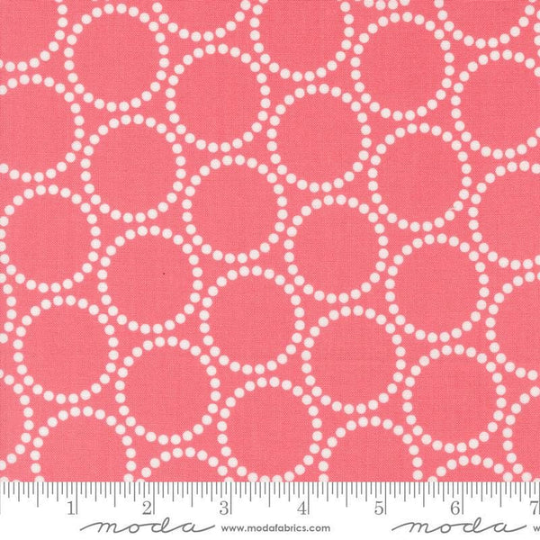 Image of the Love Letter Dots Tea Rose quilting cotton fabric by Lizzy House for Moda Fabrics. Features dotted circles on a pink background. Cure Little Fabric Shop