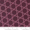 Image of the Love Letter Dots Merlot quilting cotton fabric by Lizzy House for Moda Fabrics. Features dotted circles on a purple background. Cure Little Fabric Shop