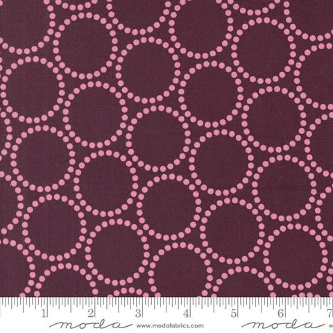 Image of the Love Letter Dots Merlot quilting cotton fabric by Lizzy House for Moda Fabrics. Features dotted circles on a purple background. Cure Little Fabric Shop