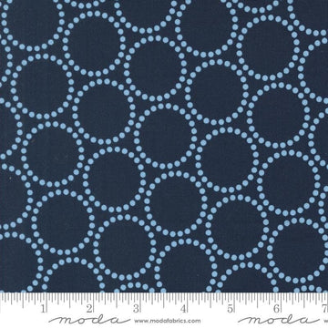 Image of the Love Letter Dots Peacoat quilting cotton fabric by Lizzy House for Moda Fabrics. Features dotted circles on a blue background. Cure Little Fabric Shop