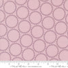 Image of the Love Letter Dots Mauve quilting cotton fabric by Lizzy House for Moda Fabrics. Features dotted circles on a pink background. Cure Little Fabric Shop