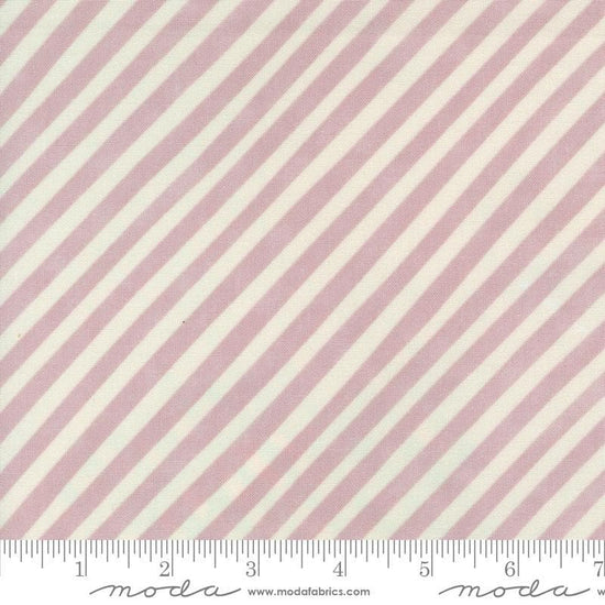 Image of the Love Letter Stripes Mauve quilting cotton fabric by Lizzy House for Moda Fabrics. Features diagonal stripes on a purple background. Cure Little Fabric Shop