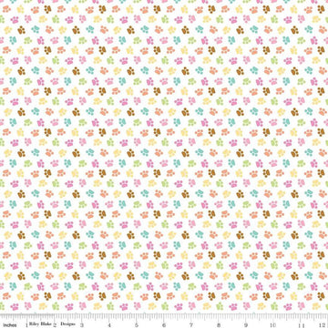 Image of the Pretty Kitty™ Paws White quilting cotton fabric by Doodlebug Design Inc for Riley Blake Designs. Features small paws on a white background. Cute Little Fabric Shop