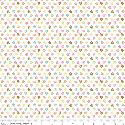 Image of the Pretty Kitty™ Paws White quilting cotton fabric by Doodlebug Design Inc for Riley Blake Designs. Features small paws on a white background. Cute Little Fabric Shop