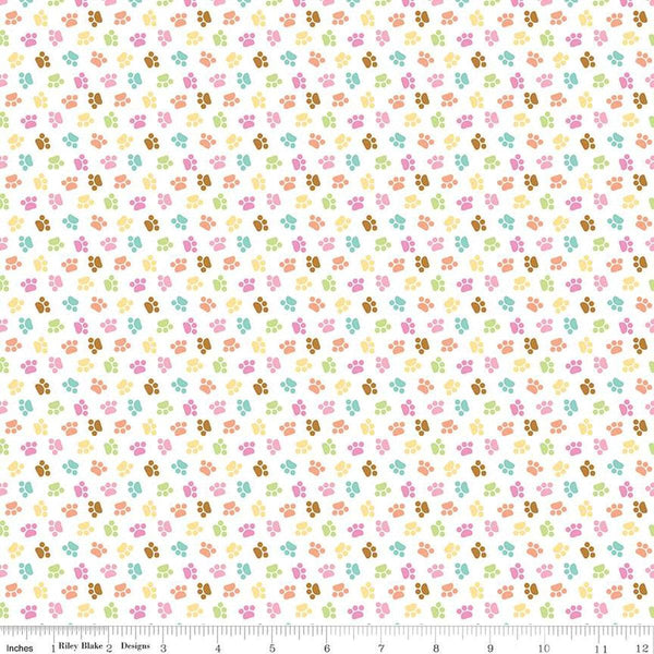 Image of the Pretty Kitty™ Paws White quilting cotton fabric by Doodlebug Design Inc for Riley Blake Designs. Features small paws on a white background. Cute Little Fabric Shop